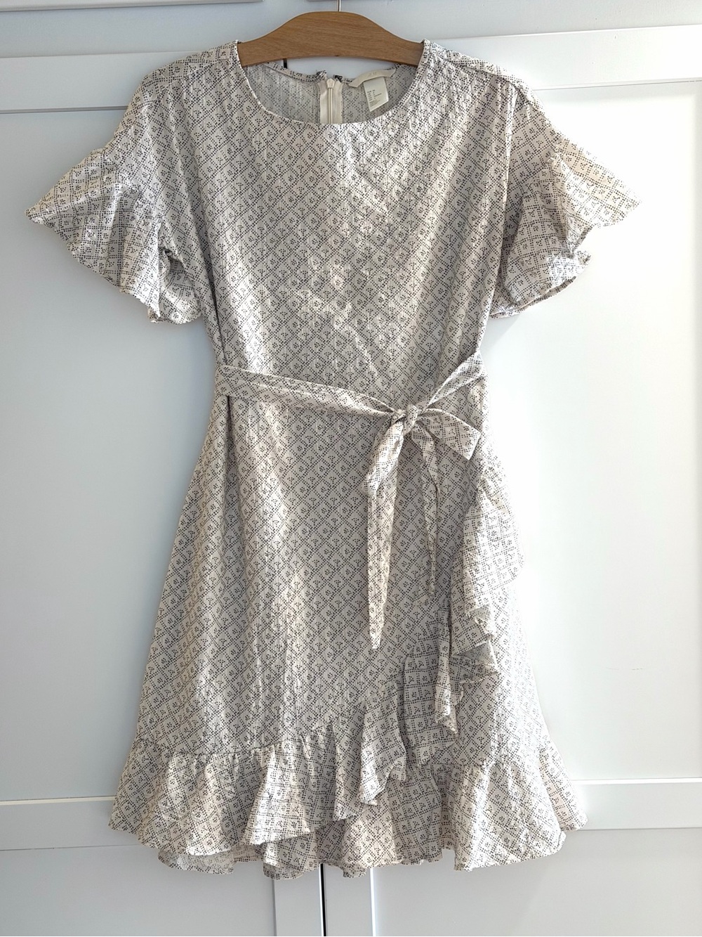 H&M Wrap dress, Cotton knee length boho pattern, flutter sleeves, ruffle hem